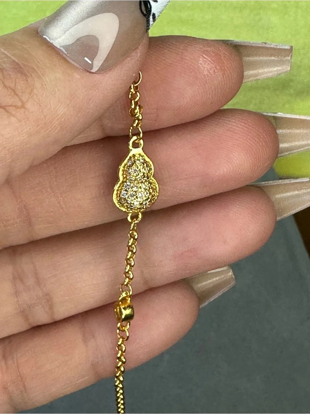 Gold Tone Women’s Necklace with Textured Shell Accent